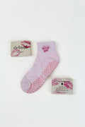 PREORDER: Let's Go Girls Grip Socks in pink with heart-shaped grips and matching packaging on a white background